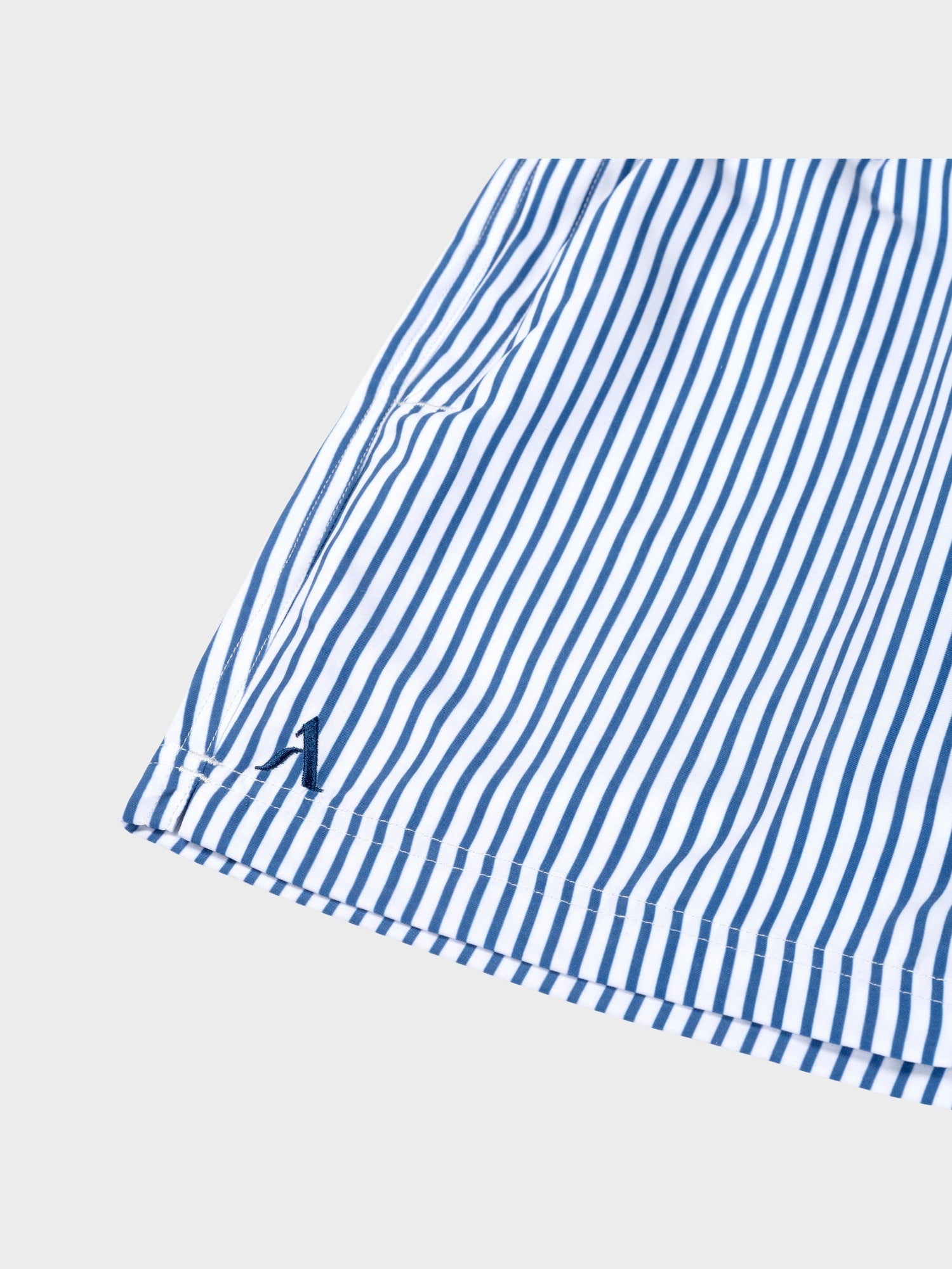 Kinder zwembroek met blauwe strepen detail